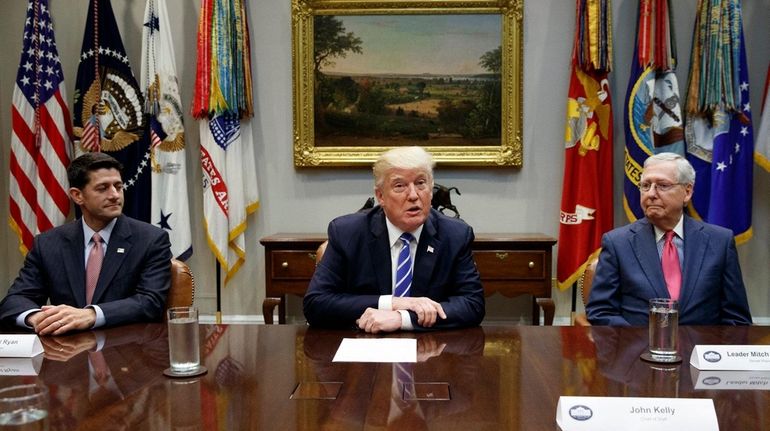 House Speaker Paul Ryan, left, and Senate Majority Leader Mitch...