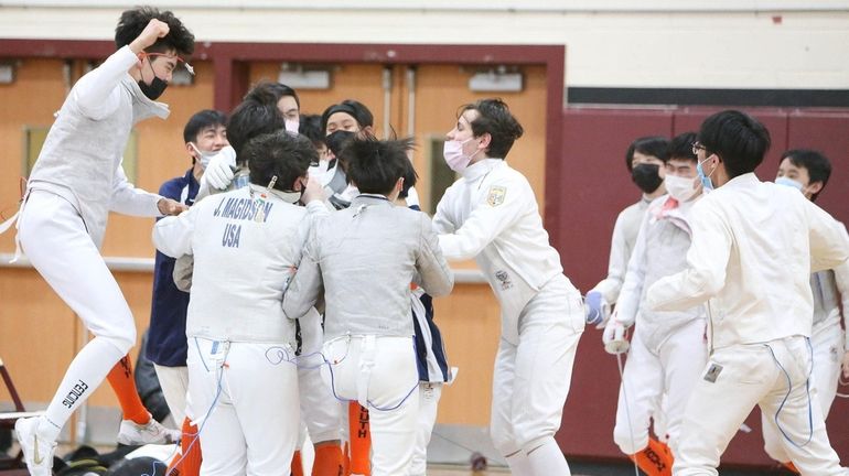 Great Neck South celebrates its win during the the Long...