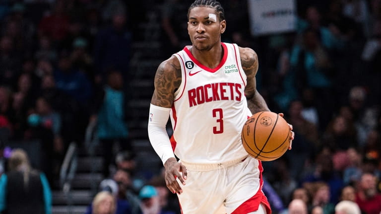 Houston Rockets guard Kevin Porter Jr. (3) brings the ball...