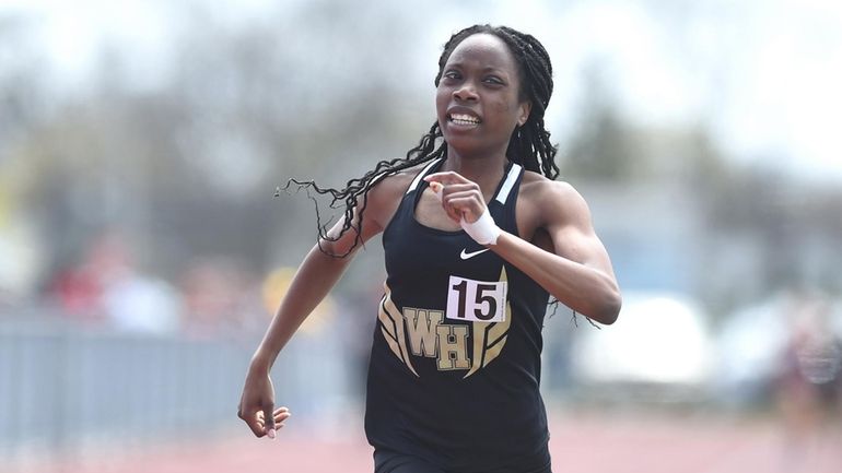 Victoria Guerrier of West Hempstead eyes the finish line in...