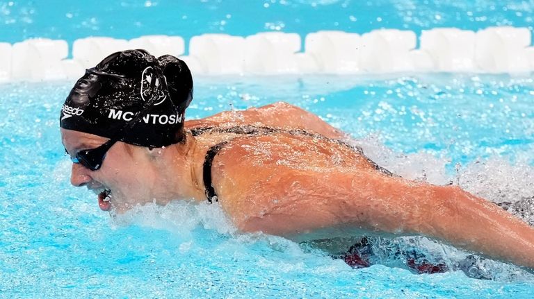 Summer McIntosh, of Canada, competes in the women's 200-meter butterfly...