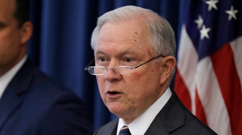 U.S. Attorney General Jeff Sessions speaks during a news conference...