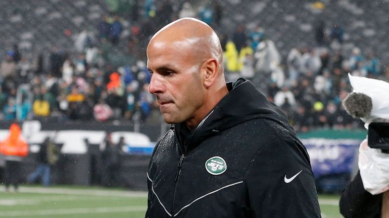 Head coach Robert Saleh of the Jets walks off the...