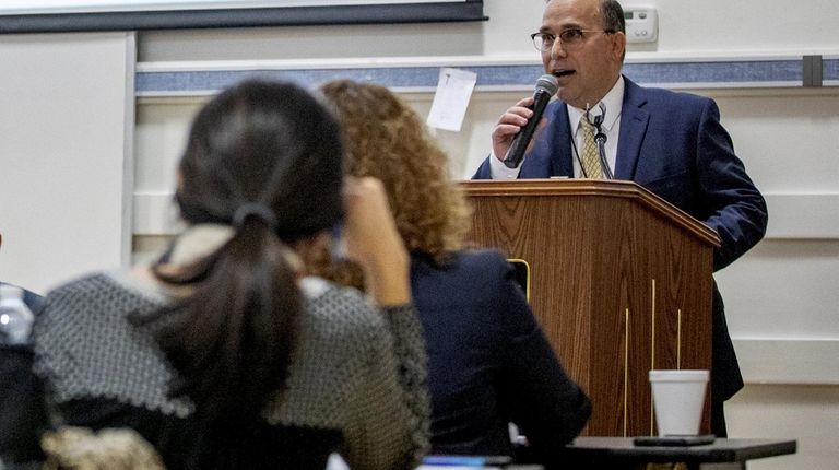 Joseph Famularo, superintendent of the Bellmore school district, speaks at...