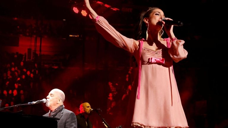 Father-daughter reunion: Billy Joel and Alexa Ray Joel perform together.