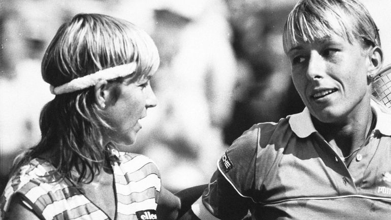 Martina Navratilova, right, is congratulated at the net by Chris...