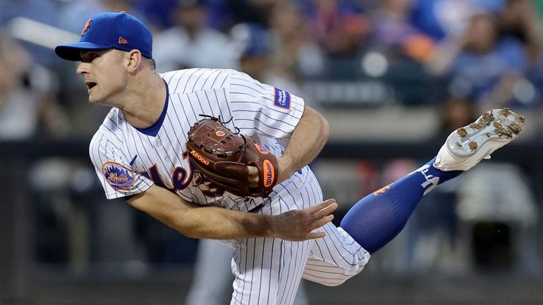 David Robertson of the Mets pitches against the Dodgers at Citi Field on July...