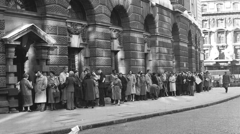 A queue forms outside The Old Bailey Central Criminal Court...