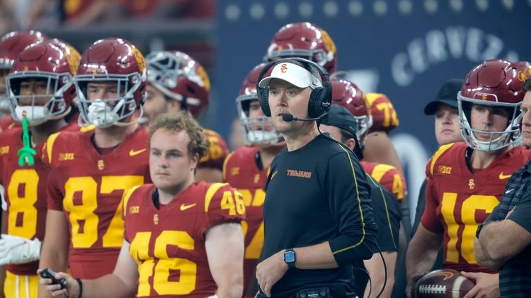 Southern California head coach Lincoln Riley watches a play during...