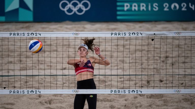 United States' Kristen Nuss looks on after returning the ball...