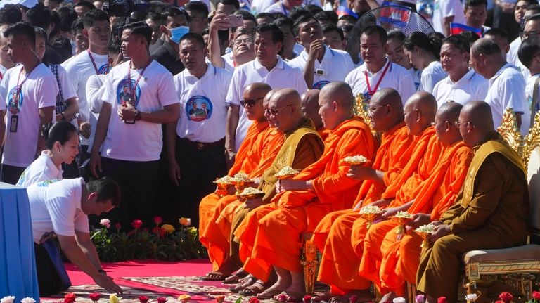 Cambodian Prime Minister Hun Manet and his wife Pich Chanmony,...