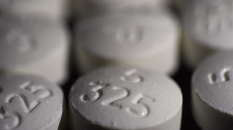 An arrangement of pills of the opioid oxycodone-acetaminophen in Manhattan...