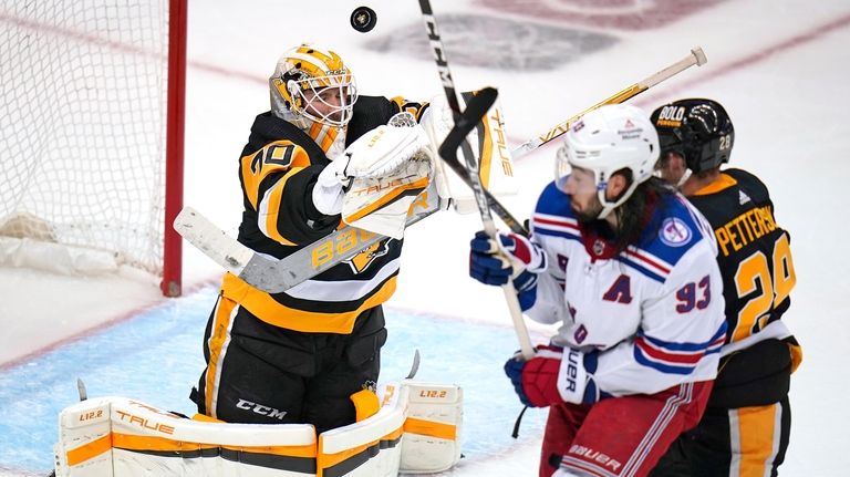 Penguins goaltender Louis Domingue in net in Game 6 of an...