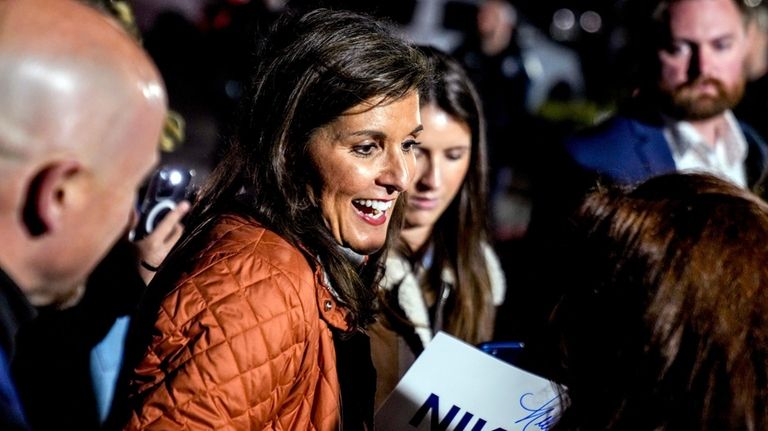 Republican presidential candidate former UN Ambassador Nikki Haley greets members...