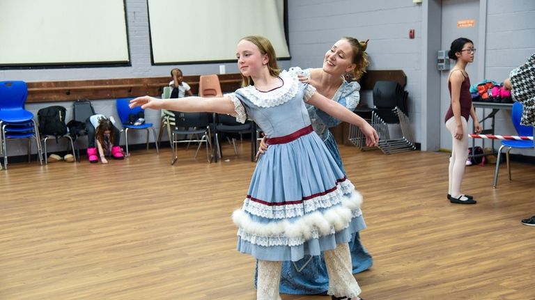 Nicole Loizides Albruzzese,right, plays the mother in the Ohman Ballet...