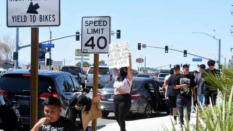 Protesters demonstrate in Victorville, Calif., on Sunday, Sept. 24, 2023,...