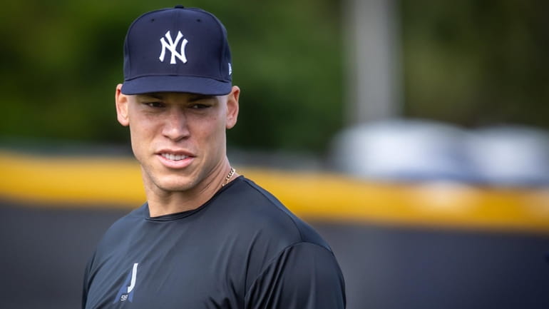 The Yankees’ Aaron Judge fields during spring training in Tampa,...