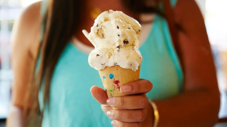 Chocolate chip ice cream is served in a cookie cone...