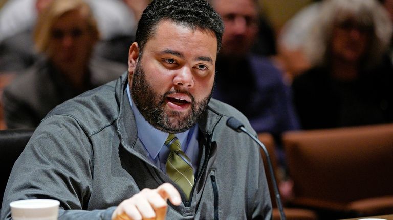 State Sen. Justin Wayne, D-Omaha, speaks during a hearing at...