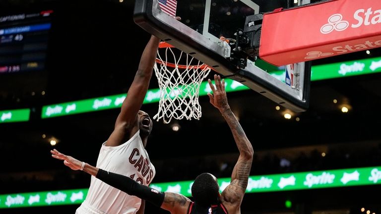 Atlanta Hawks' Dejounte Murray (5) shoots and scores against Cleveland...