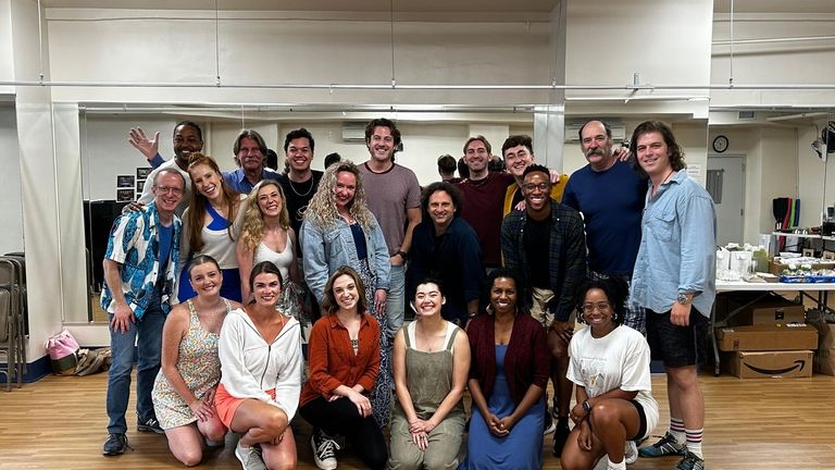 The cast of "Escape to Margaritaville," a musical play being...