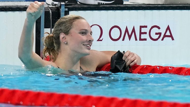 Summer McIntosh, of Canada, celebrates after winning the women's 400-meter...