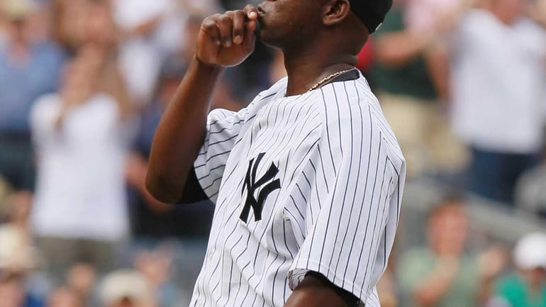 Rafael Soriano celebrates after closing out a game against the...