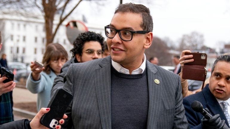 Rep. George Santos (R-Nassau/Queens) leaves a House GOP conference meeting...