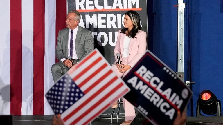 Former Independent candidate for president Robert F. Kennedy, Jr., left,...