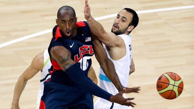 United States' Kobe Bryant is defended by Argentina's Manu Ginobili,...