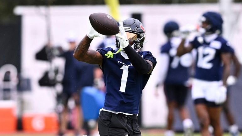 Houston Texans wide receiver Stefon Diggs (1) catches a pass...