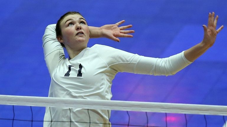 Massapequa’s Erin Stanley lines up a shot during pool play...