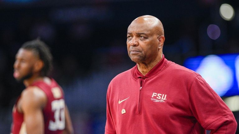 Florida State head coach Leonard Hamilton watches his team during...