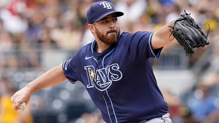 Tampa Bay Rays starting pitcher Aaron Civale delivers during the...