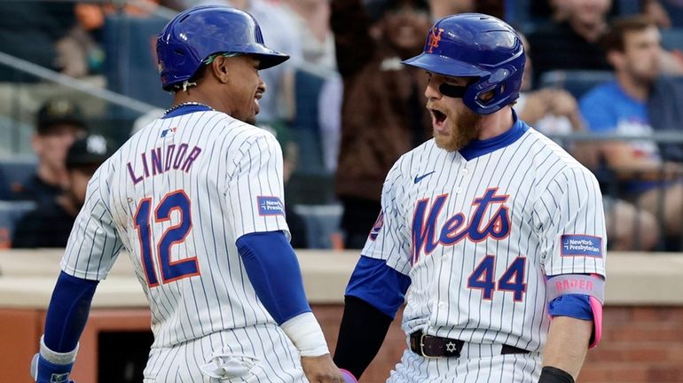 Harrison Bader of the Mets celebrates his first inning two...