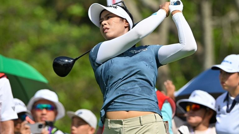 Patty Tavatanakit of Thailand tees off on the second hole...