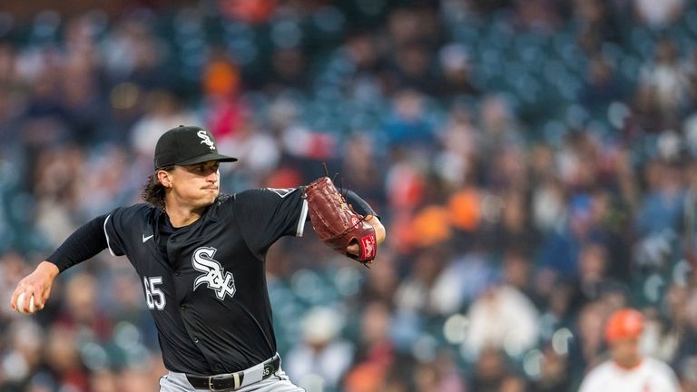 Chicago White Sox pitcher Davis Martin (65) throws during the...