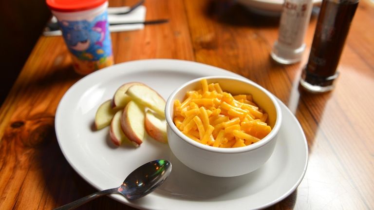 Macaroni and cheese with apple slices from the kid's menu...