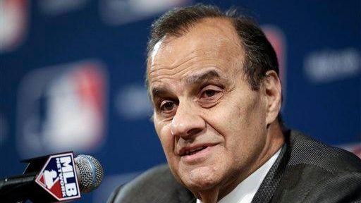 Joe Torre answers questions at the baseball winter meetings in...