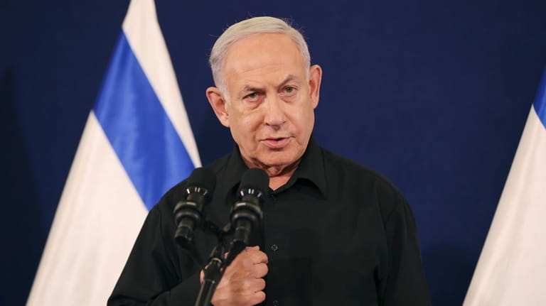 Israeli Prime Minister Benjamin Netanyahu speaks during a news conference...