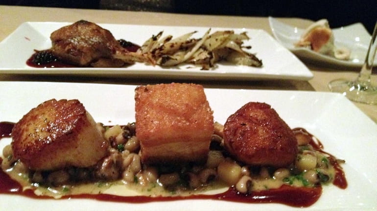 The diver scallops and crisp pork belly combo highlights small...