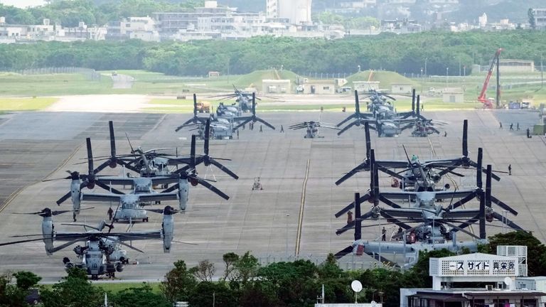 U.S. MV-22 Osprey transport aircraft are parked at the U.S....