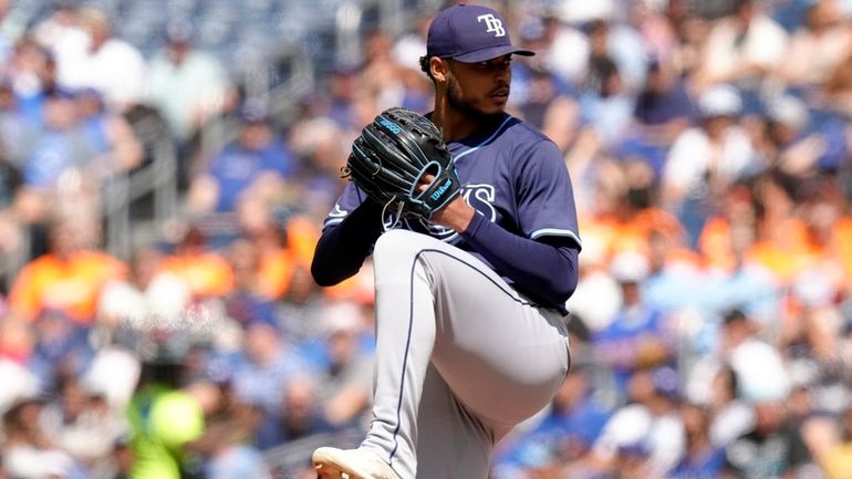 Tampa Bay Rays pitcher Taj Bradley works against Toronto Blue...