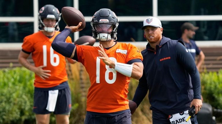 Chicago Bears quarterback Caleb Williams throws during an NFL football...