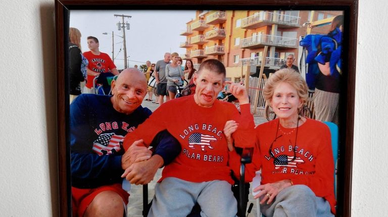 A family photo of Harvey and Ellen Weisenberg and their...