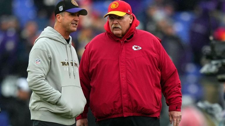 Kansas City Chiefs head coach Andy Reid and Baltimore Ravens...