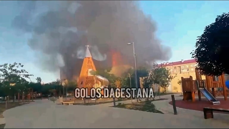 This photo taken from video released by Golos Dagestana shows...
