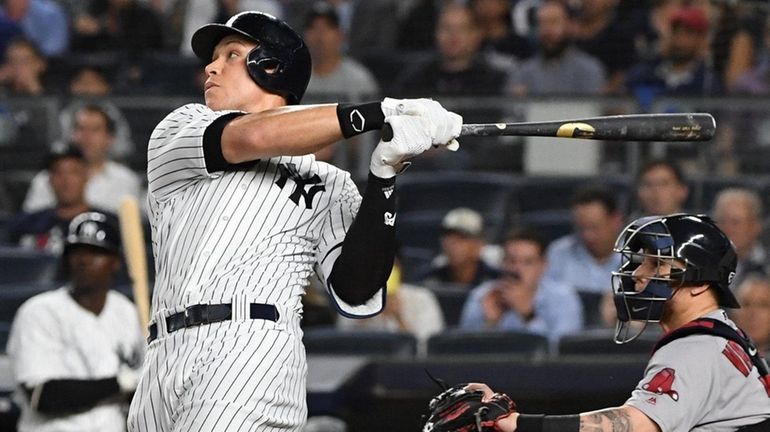 Yankees rightfielder Aaron Judge flies out during the sixth inning...