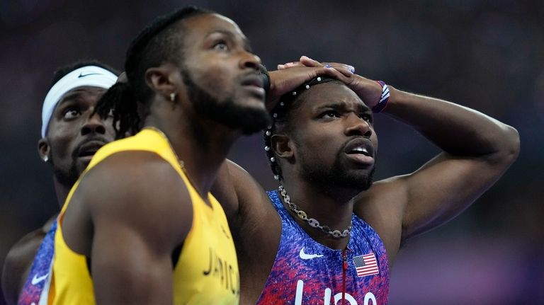 Kishane Thompson, of Jamaica, Noah Lyles, of the United States,...