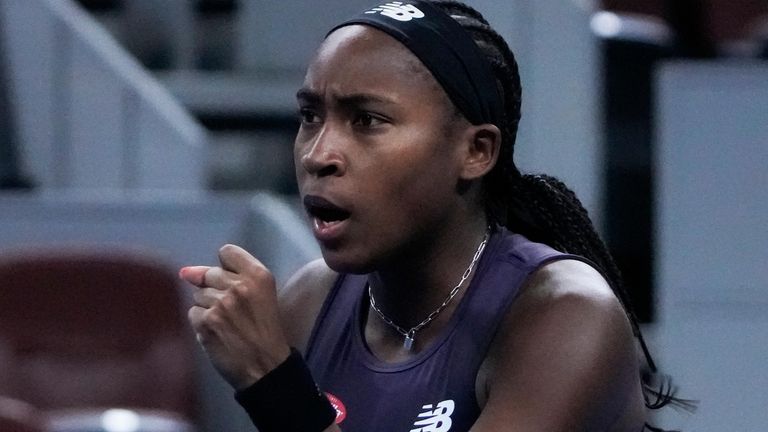 Coco Gauff of the United States reacts after scoring a...